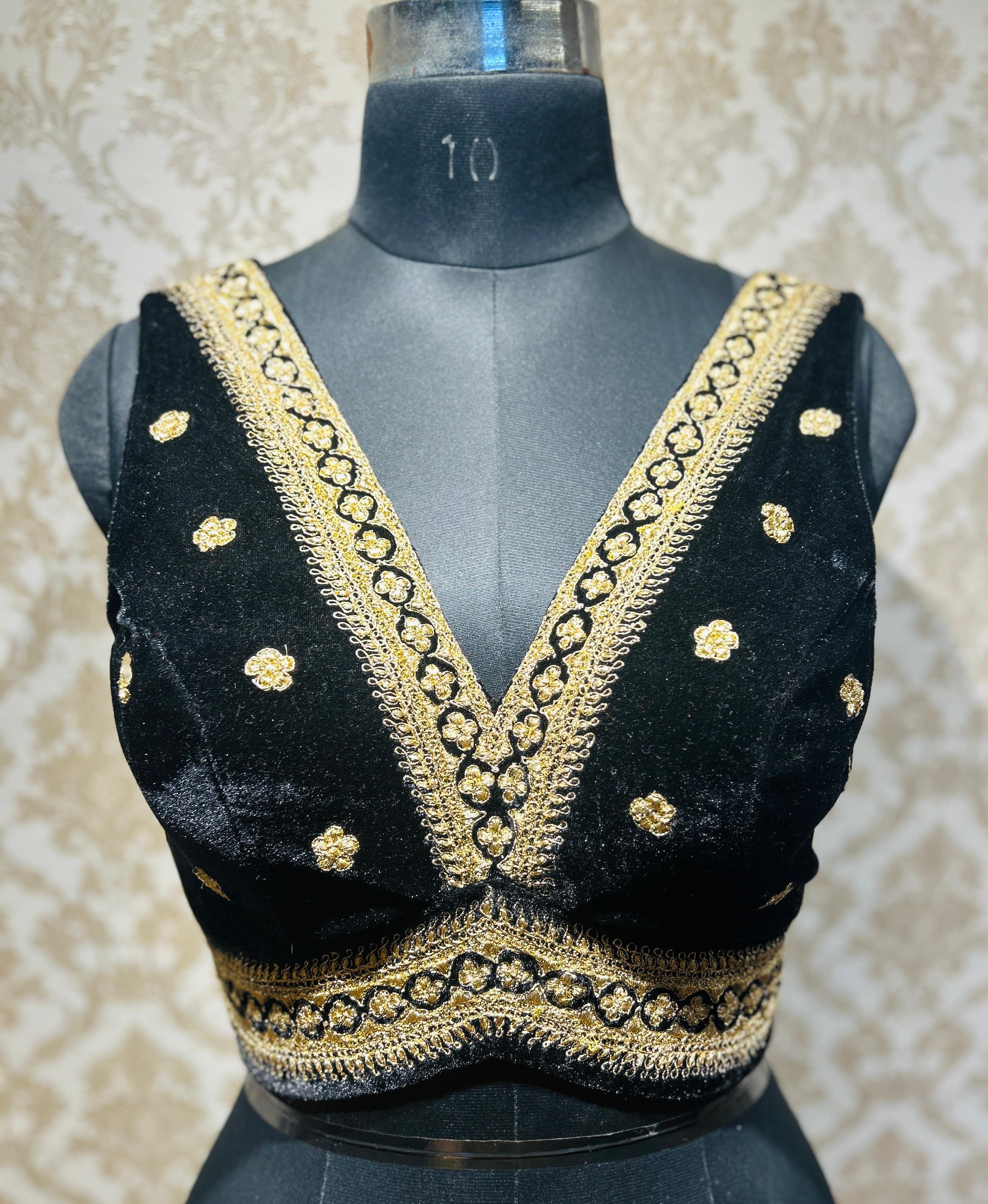 Black sleeveless velvet blouse